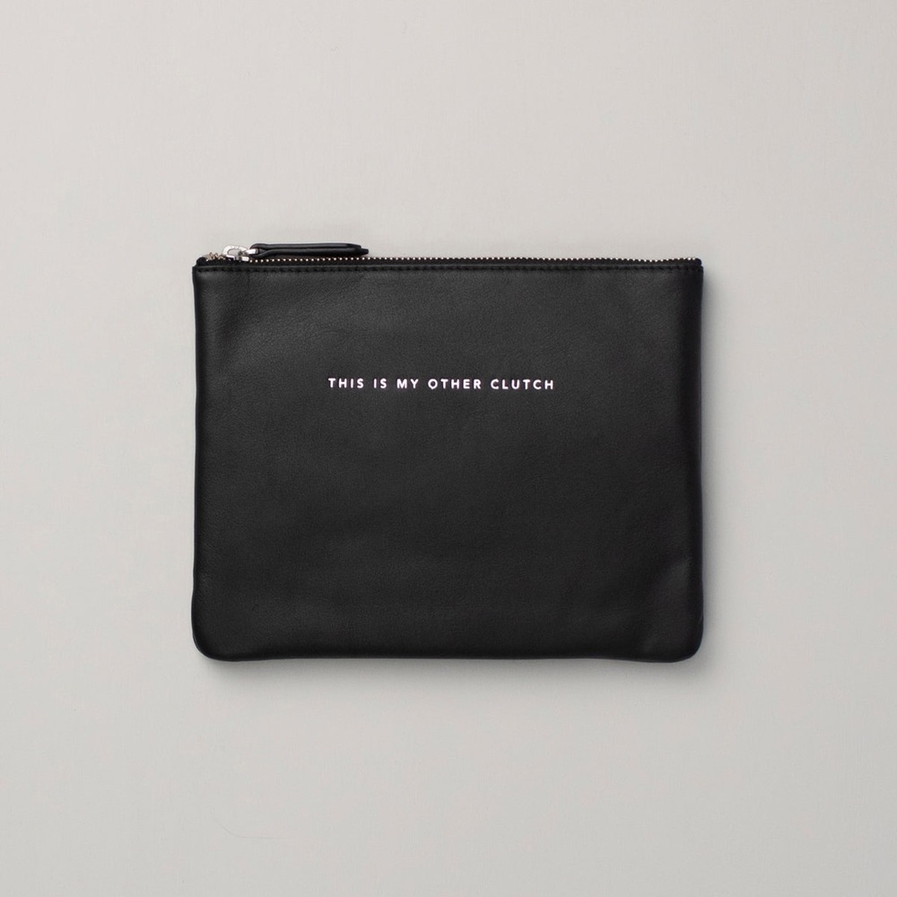 NWOT Genuine Leather travel Pouch.
